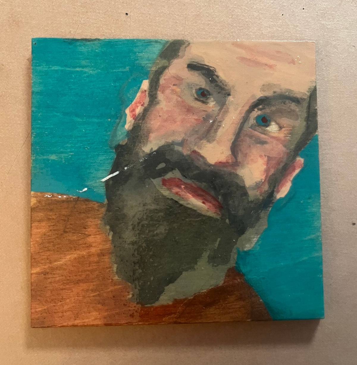 Man with Beard on Blue